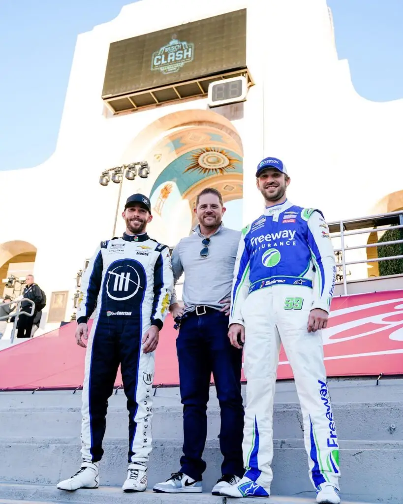 Justin Marks stands with Ross Chastain on his left and Daniel Suarez on his right at the L.A. Clash.