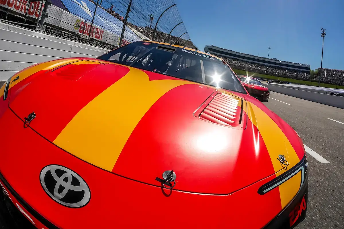 The hood of Bubba Wallace's red and yellow No. 23 McDonald's Toyota.