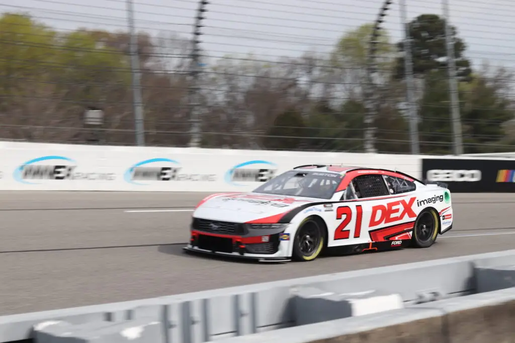 Harrison Burton races his No. 21 DEX Imaging Ford around the track.