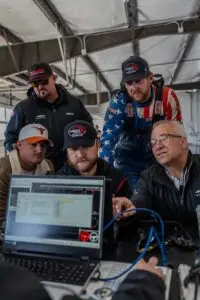 McFarland and RCR personnel analyzing track data. Photo: @RCRracing on X